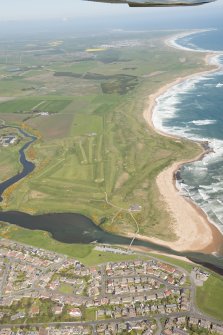 General oblique aerial view of Craigewan Links centred on Peterhead Golf Courses, looking to the N.