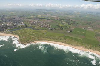 General oblique aerial view of Craigewan Links centred on Peterhead Golf Courses, looking to the WSW.