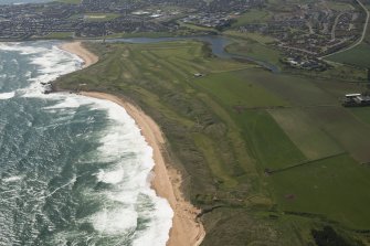 General oblique aerial view of Craigewan Links centred on Peterhead Golf Courses, looking to the S.