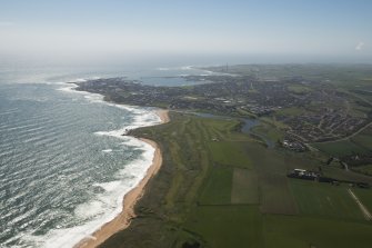 General oblique aerial view of Craigewan Links centred on Peterhead Golf Courses, looking to the S.