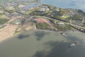 Oblique aerial view during construction of the New Forth Bridge Crossing, looking to the NNE.