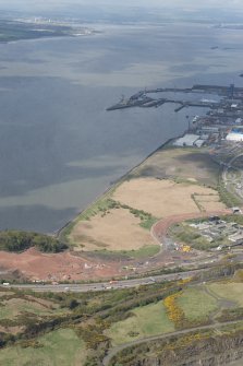 Oblique aerial view during construction of the New Forth Bridge Crossing, looking to the SSW.