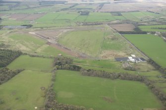 Oblique aerial view of Kirknewton Airfield, looking to the S.
