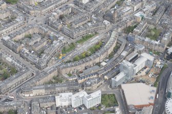 Oblique aerial view of the Edinburgh Tram Works on Shandwick Place, looking to the N.