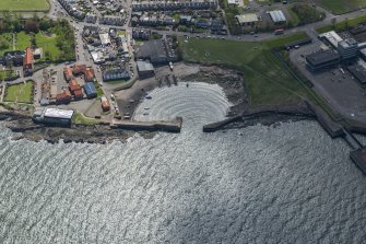 Oblique aerial view of Cockenzie Harbour, looking to the SE.