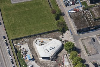 Oblique aerial view of building construction of the Elizabeth Montgomerie Foundation within Aberdeen Royal Infirmary, looking to the W.