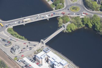 General oblique aerial view of Wellington Suspension Bridge with Queen Elizabeth Bridge adjacent, looking to the NE.