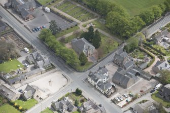 Oblique aerial view of Echt Parish Church, looking to the SE.