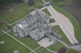 Oblique aerial view of Dunecht House and chapel, looking to the NW.