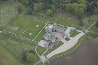 Oblique aerial view of Dunecht House and chapel, looking to the SW.