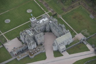 Oblique aerial view of Dunecht House and chapel, looking to the SSW.