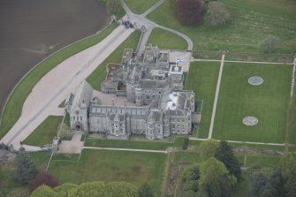 Oblique aerial view of Dunecht House and chapel, looking to the ENE.