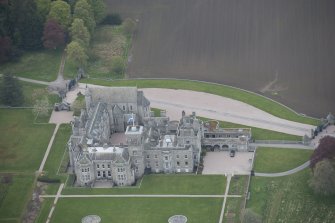 Oblique aerial view of Dunecht House and chapel, looking to the NNW.