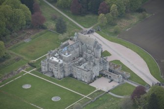 Oblique aerial view of Dunecht House and chapel, looking to the NW.