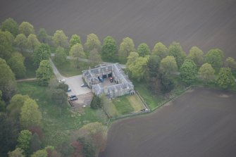 Oblique aerial view of Dunecht House stable blocks, looking to the NNW.