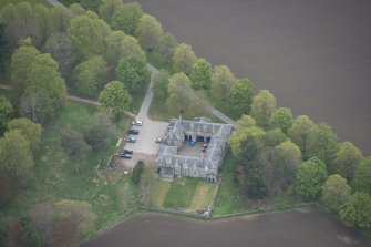 Oblique aerial view of Dunecht House stable blocks, looking to the WSW.