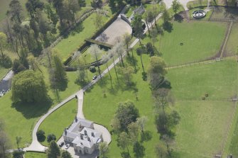 General oblique aerial view of Linton House with adjacent walled garden, looking to the WSW.