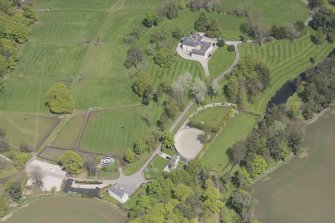 General oblique aerial view of Linton House with adjacent walled garden, looking to the NE.
