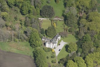Oblique aerial view of Corsindae House with adjacent walled garden, looking to the ENE.