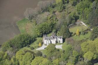 Oblique aerial view of Corsindae House with adjacent walled garden, looking to the N.
