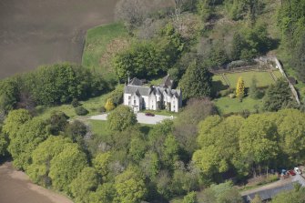 Oblique aerial view of Corsindae House with adjacent walled garden, looking to the NNW.