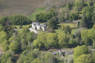 Oblique aerial view of Corsindae House with adjacent walled garden, looking to the NW.