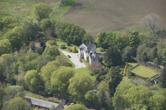 Oblique aerial view of Corsindae House with adjacent walled garden, looking to the WNW.