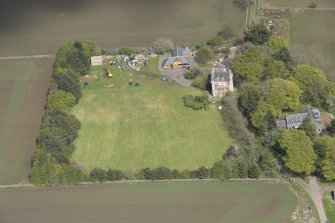 Oblique aerial view of Tillycairn House, looking to the NE.