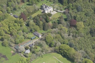 General oblique aerial view of Kemnay House with adjacent farm house, looking to the E.