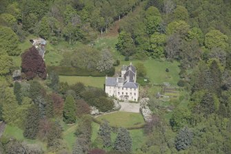 Oblique aerial view of Kemnay House, looking to the NNE.