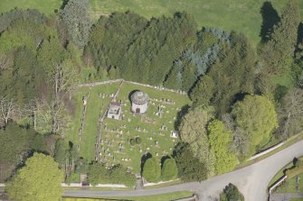 General oblique aerial view of Cluny Old Churchyard centred on the Fraser Mausoluem, looking to the NE.