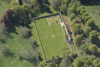 Oblique aerial view of Cluny Castle walled garden, looking to the W.