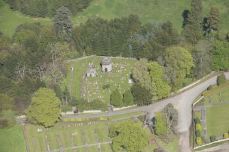 General oblique aerial view of Cluny Old Churchyard centred on the Fraser Mausoluem, looking to the NE.
