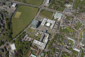 General oblique aerial view of Aberdeen University Campus centred on the Sir Duncan Rice Library with adjacent Science and Engineering Building, looking to the NNW.