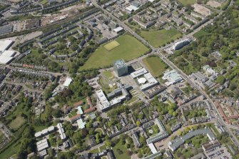General oblique aerial view of Aberdeen University Campus centred on the Sir Duncan Rice Library with adjacent Science and Engineering Building, looking to the NW.