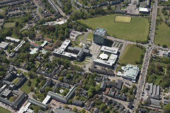 General oblique aerial view of Aberdeen University Campus centred on the Sir Duncan Rice Library with adjacent Science and Engineering Building, looking to the W.