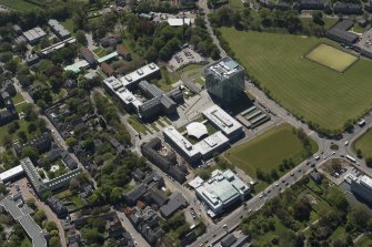 General oblique aerial view of Aberdeen University Campus centred on the Sir Duncan Rice Library with adjacent Science and Engineering Building, looking to the SW.