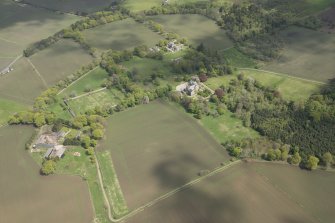 General oblique aerial view of Skene House estate centred on Skene House with adjacent walled garden, looking to the ENE.