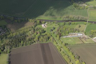 General oblique aerial view of Monymusk House estate centred on Monymusk House, looking to the NNE.