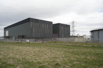 General view from West showing substation and storage tank.