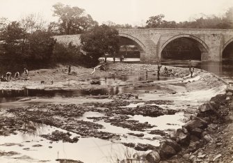 Stair Bridge from south east. Weir under reconstruction taken from lade intake for Water of Ayr Hone Works, Dalmore Mill. From family album of Mr K Montgomerie. Survey of Private Collection