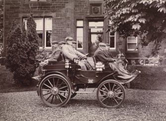 Dalmore House, six seater dog cart style Arrol Johnston car (10hp, wooden body, manufactured either in Camlachie, Glasgow  (pre-1901), or Paisley, Renfrewshire). From family album of Mr K Montgomerie. Survey of Private Collection