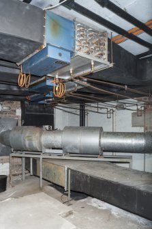 Interior. General view of original air conditioning system in basement room B25.