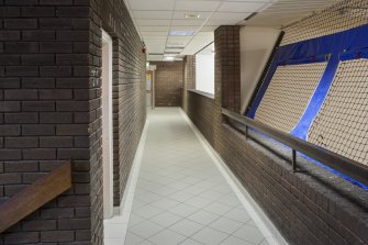 Interior. View from South along squash court viewing corridor.