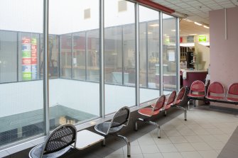 Interior. View from South West of glazed lightwell leading to pool below.