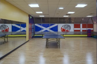 Interior. View into dance studio above ice rink.