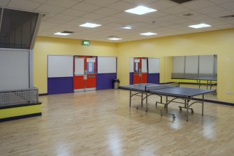 Interior. View into dance studio above ice rink.