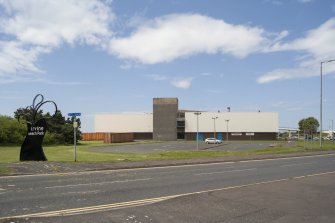 View looking to the east elevation of the Magnum Centre, including Irvine Beach Park signage.