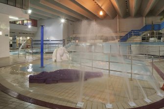 Interior. View looking east across swimming pool hall.