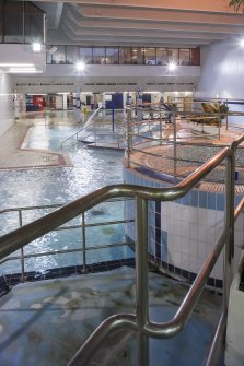 Interior. View from raised walkway looking north across the swimming pool hall.